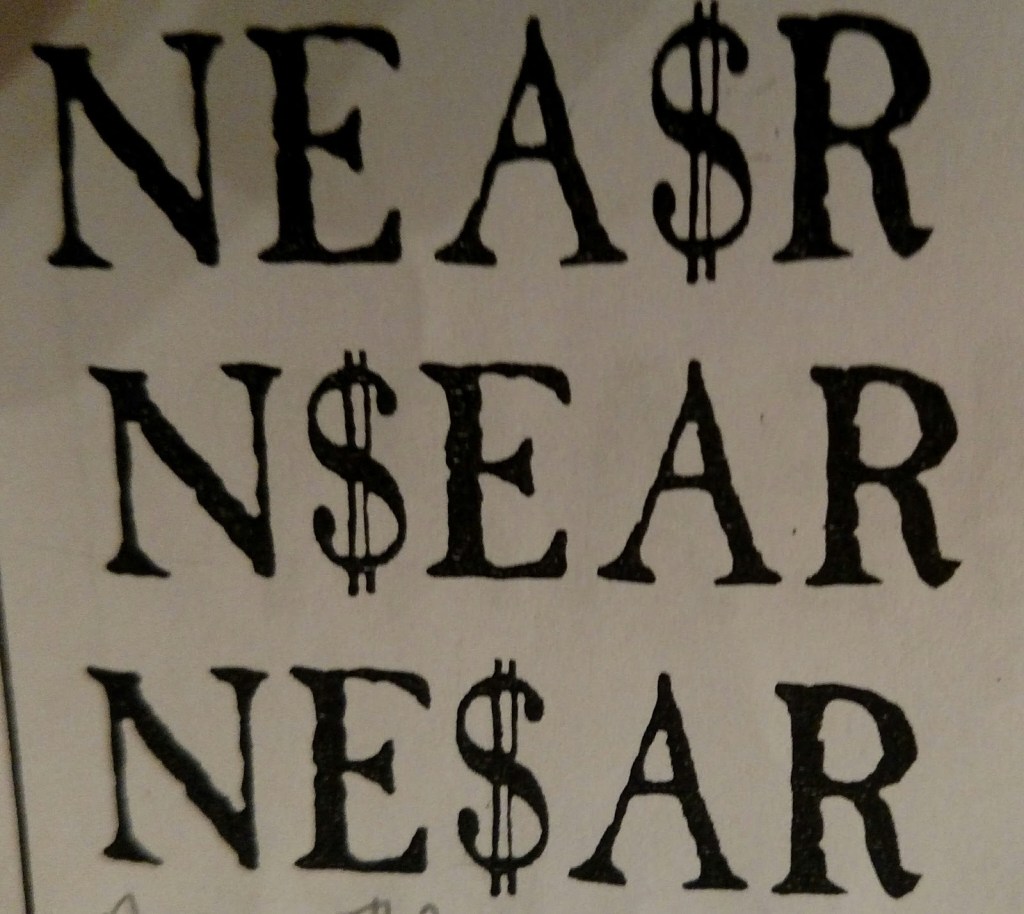 An image of a piece of paper with NEA$R on one line, N$EAR below it, and NE$AR on a final line