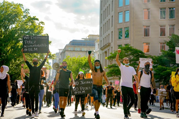 black lives matter protestors marching in the streets of washington d.c.