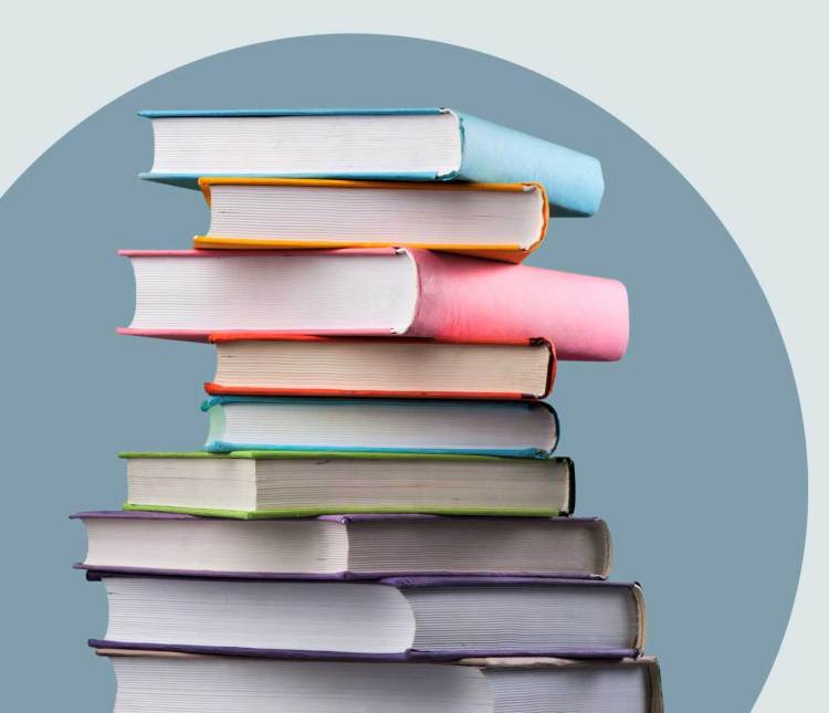 A stack of brightly colored books.