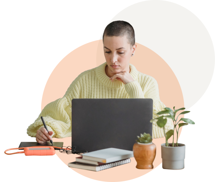 A woman working at her laptop.